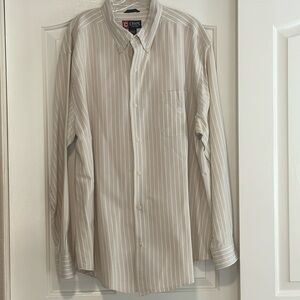 Men’s beige/white striped button down shirt in XXL. Front pocket with logo.